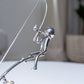 Balanssculptuur van de Visser