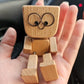 Charmant Houten figuur - 12 Gezichtsuitdrukkingen